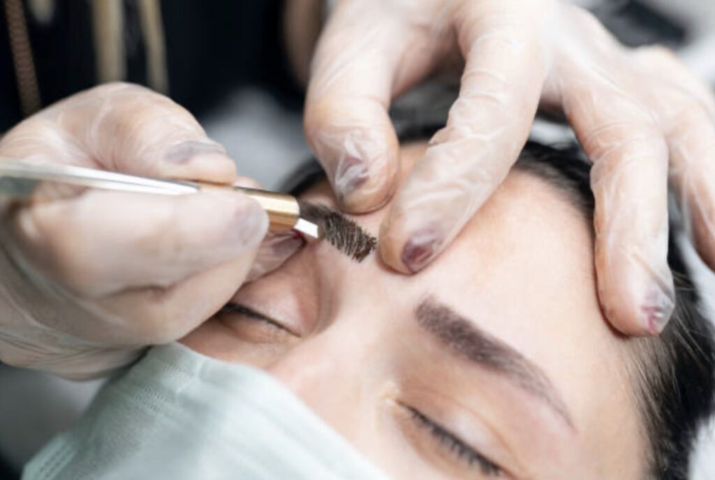 Client receiving a professional brow tint at Spa La La in Austin